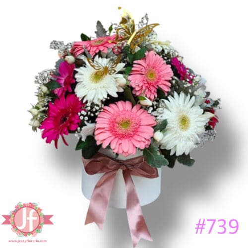 739-caja-redonda-con-20-gerberas-y-mariposa, Diferencia entre florería y floristería